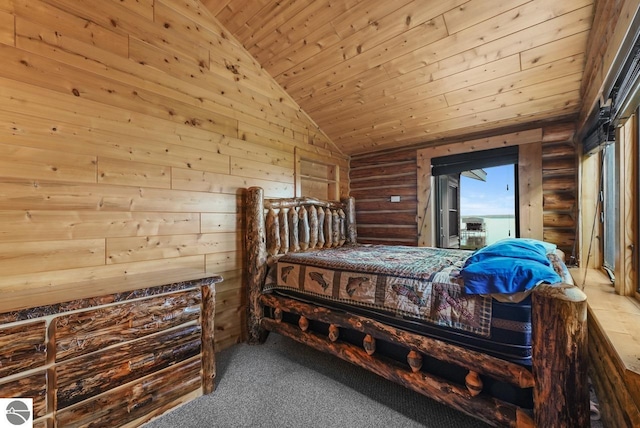 bedroom with lofted ceiling, wood ceiling, and carpet floors