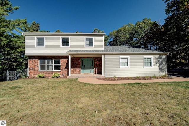 front of property featuring a front lawn