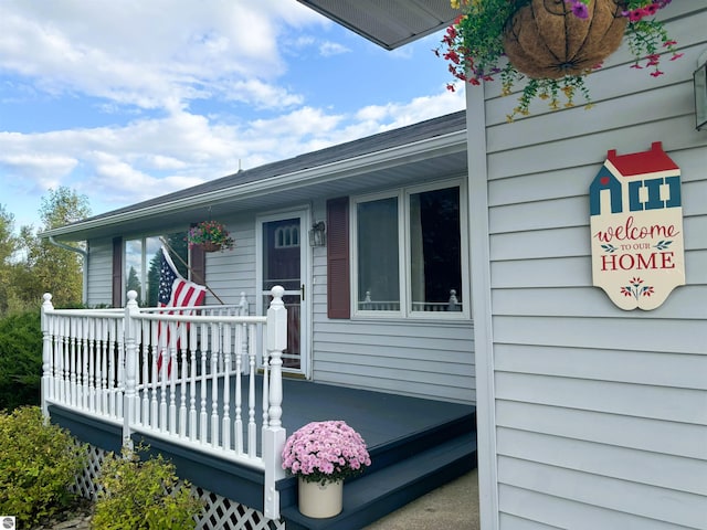 doorway to property with a deck