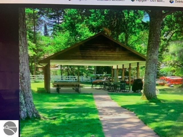 view of community with a gazebo and a yard