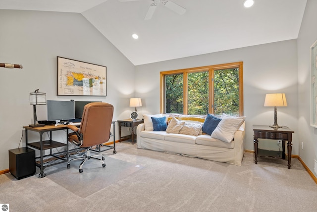 carpeted office with ceiling fan and high vaulted ceiling