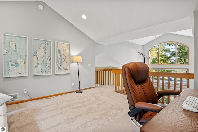 carpeted office featuring ceiling fan and lofted ceiling