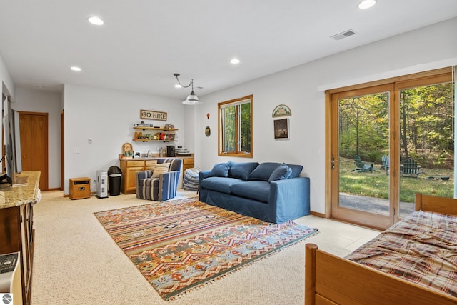 living room featuring light colored carpet