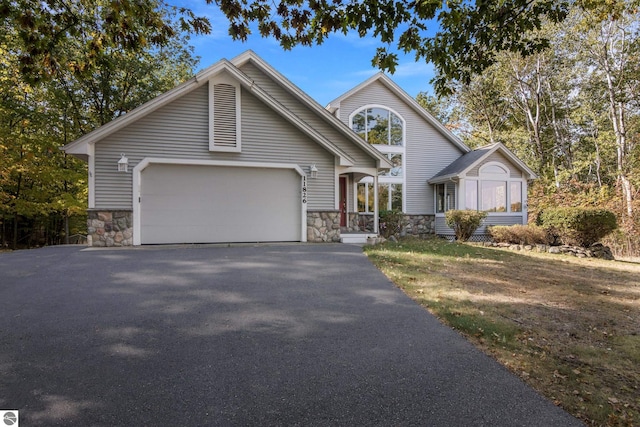 view of front of property with a garage