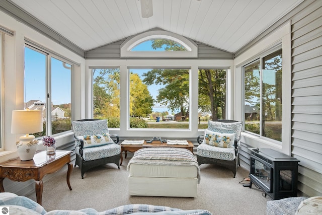 sunroom with lofted ceiling and a wealth of natural light