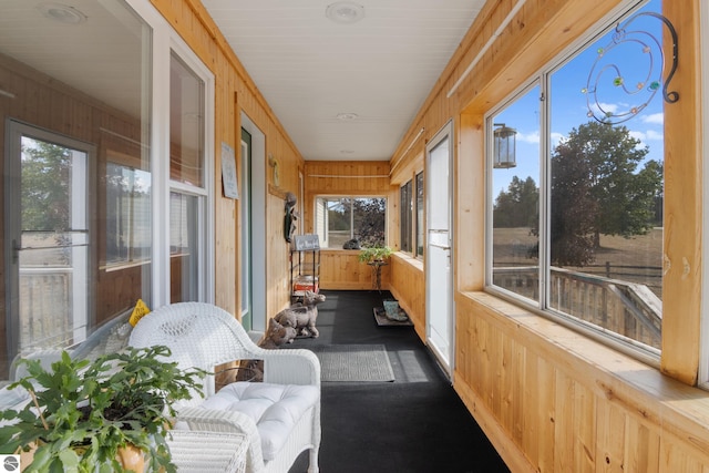 sunroom / solarium featuring plenty of natural light