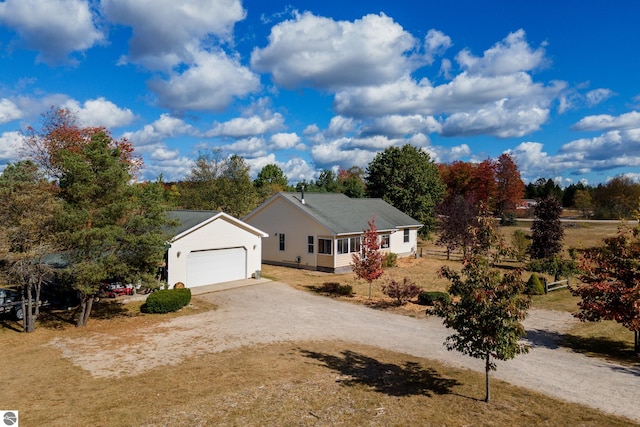 view of front of home with a porch and a garage