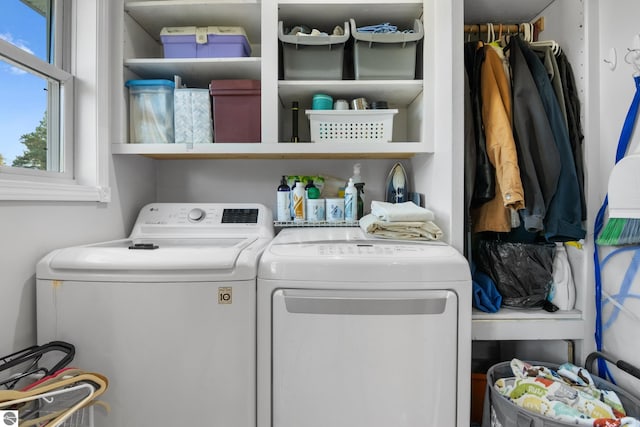 washroom featuring washer and dryer