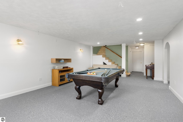 playroom with a textured ceiling and billiards