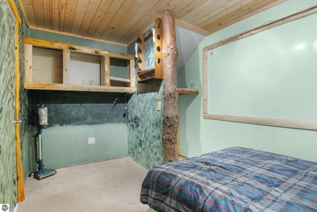 carpeted bedroom with crown molding and wooden ceiling