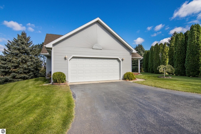 view of property exterior featuring a garage and a lawn