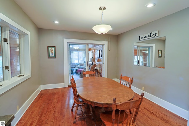 dining space featuring hardwood / wood-style floors