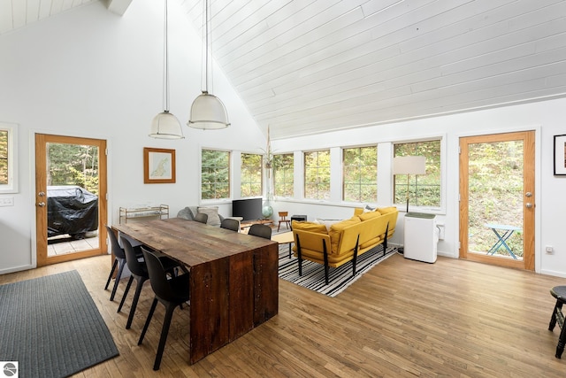 sunroom / solarium with vaulted ceiling