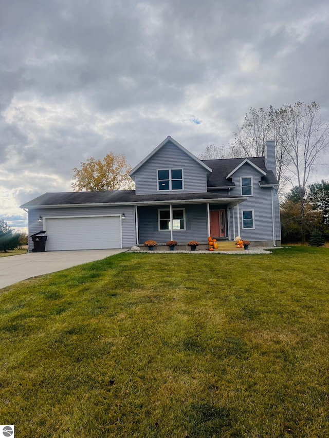 view of front facade with a front yard, a garage, and covered porch