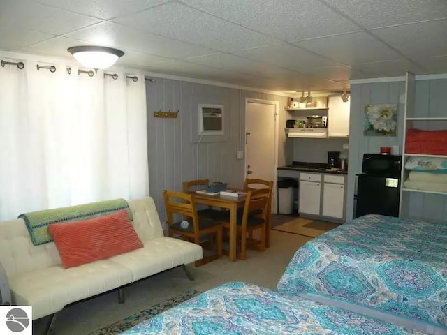 bedroom with a paneled ceiling