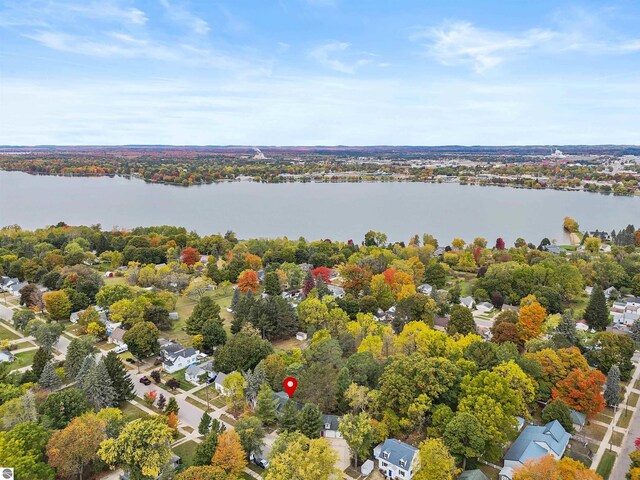 drone / aerial view with a water view