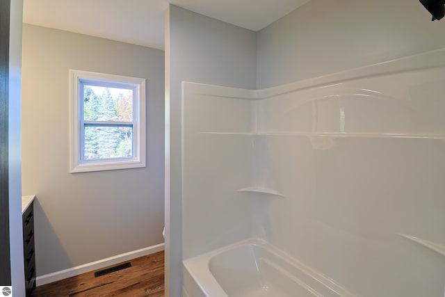 bathroom with wood-type flooring and vanity