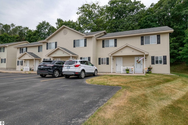 view of front of home with a front lawn