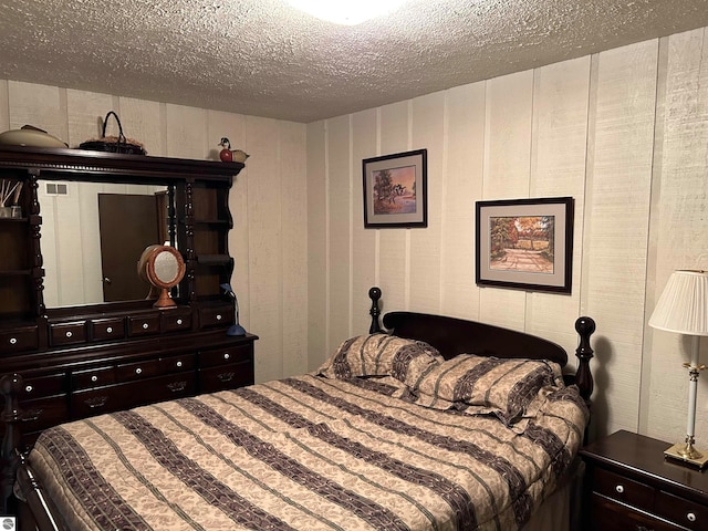 bedroom featuring a textured ceiling