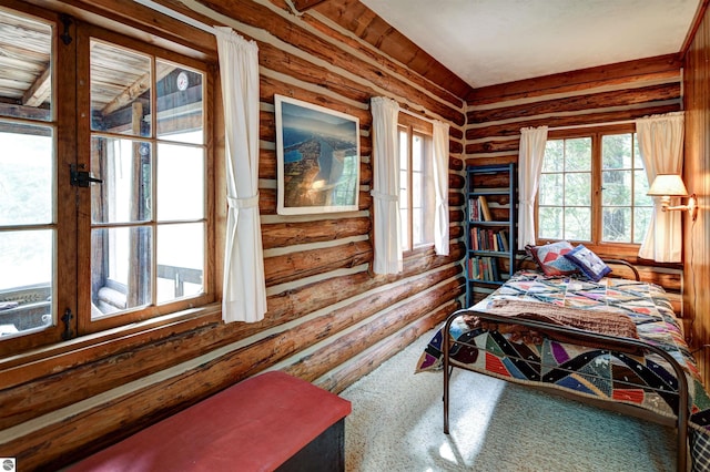 bedroom with rustic walls