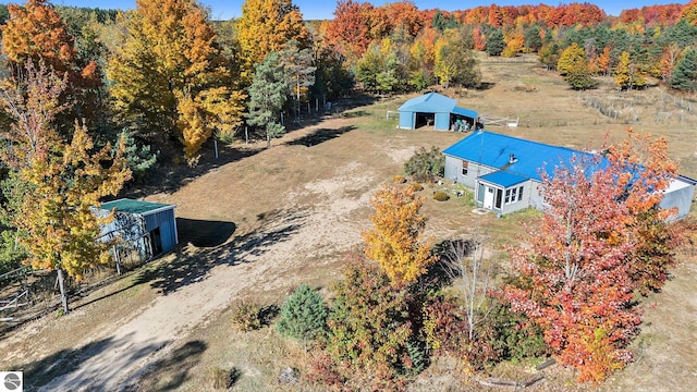 drone / aerial view with a view of trees