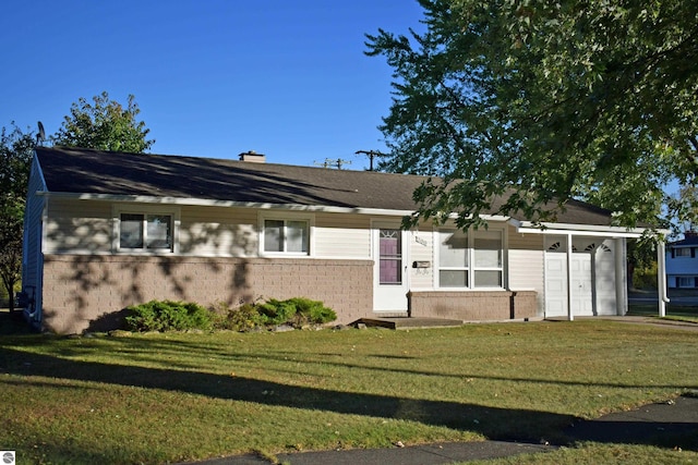 ranch-style house with a front lawn