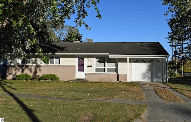 ranch-style home with a garage and a front lawn