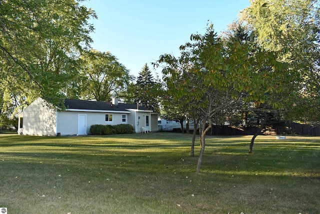 view of front of home with a front lawn