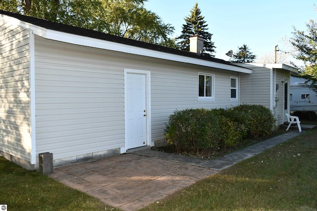 exterior space featuring a lawn