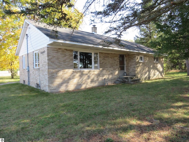 ranch-style house with a front yard