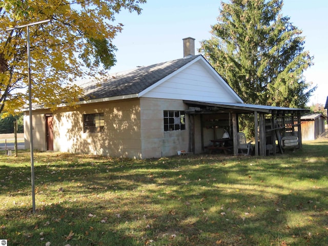 view of home's exterior featuring a yard