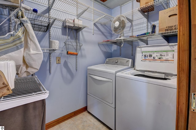 washroom with independent washer and dryer