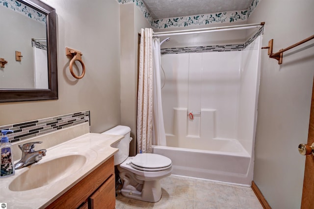 full bathroom with vanity, shower / bath combination with curtain, decorative backsplash, toilet, and a textured ceiling