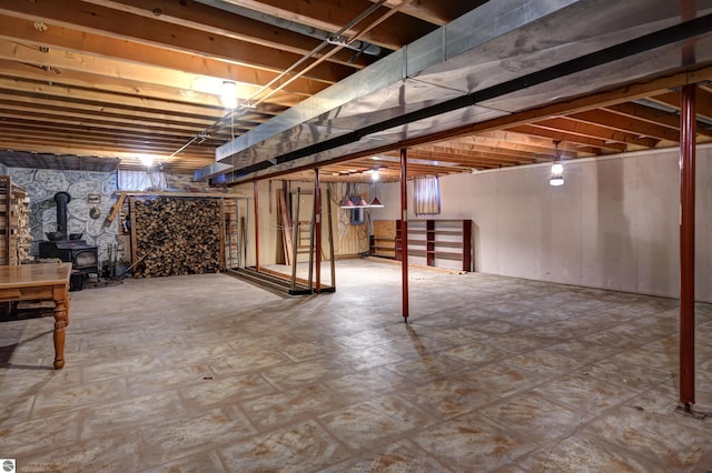 basement featuring a wood stove