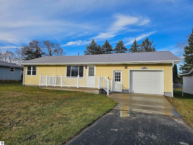 single story home with a garage and a front yard