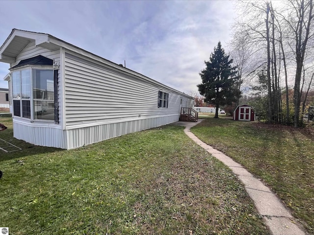 exterior space with a shed and a lawn