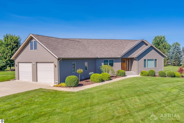 ranch-style house with a front lawn and a garage