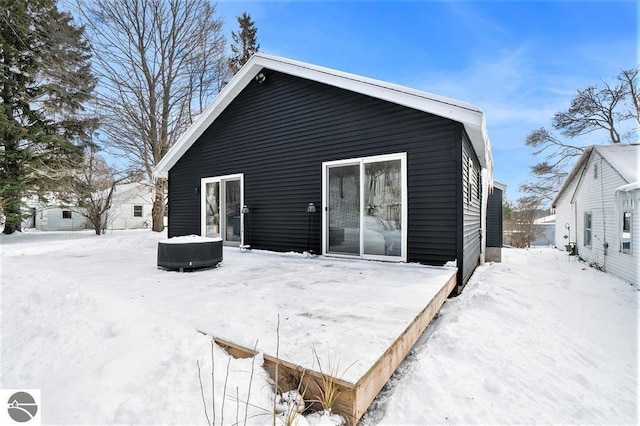 1219 Elm St, Frankfort, MI 49635 - view of snow covered back of property