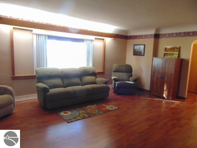 living room with wood-type flooring