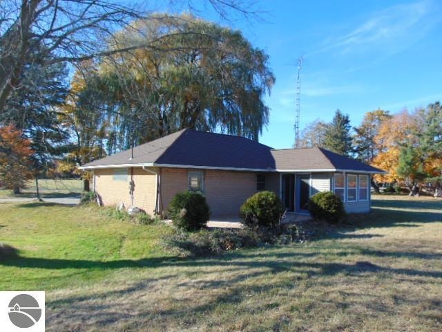 view of property exterior featuring a yard