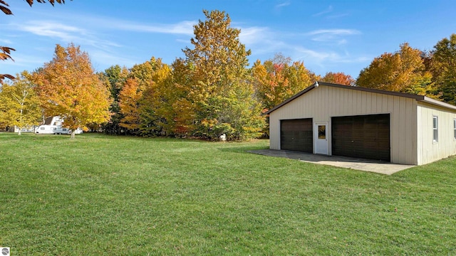 garage with a lawn