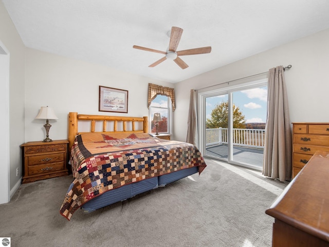 bedroom featuring access to outside, carpet flooring, and ceiling fan