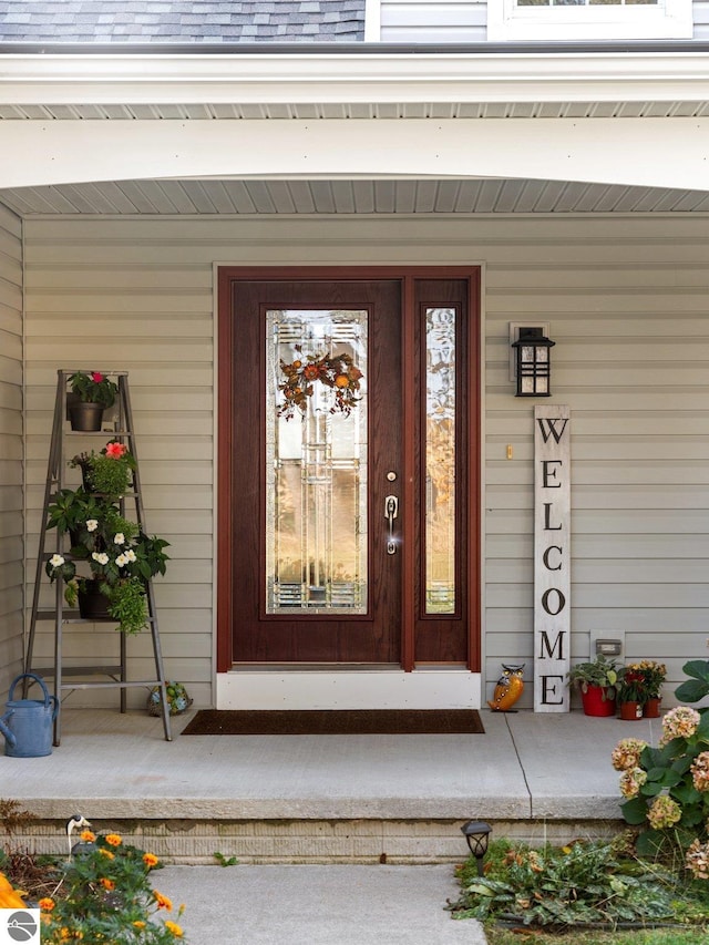 property entrance featuring covered porch