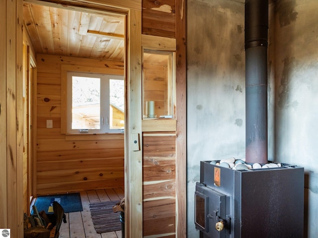 view of sauna featuring wooden walls, hardwood / wood-style flooring, and wooden ceiling