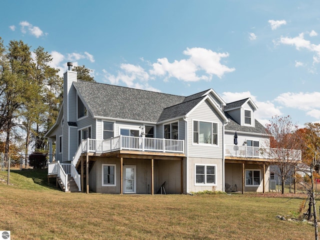 back of house featuring a lawn