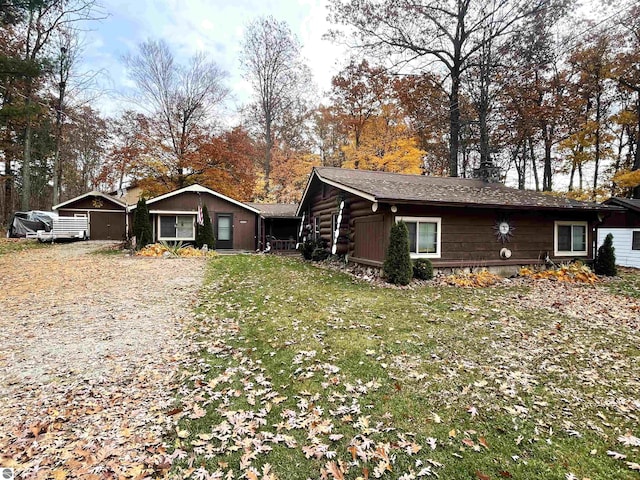 view of home's exterior with a yard