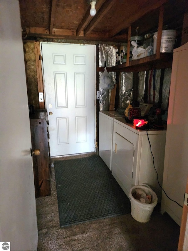 interior space featuring separate washer and dryer and carpet flooring