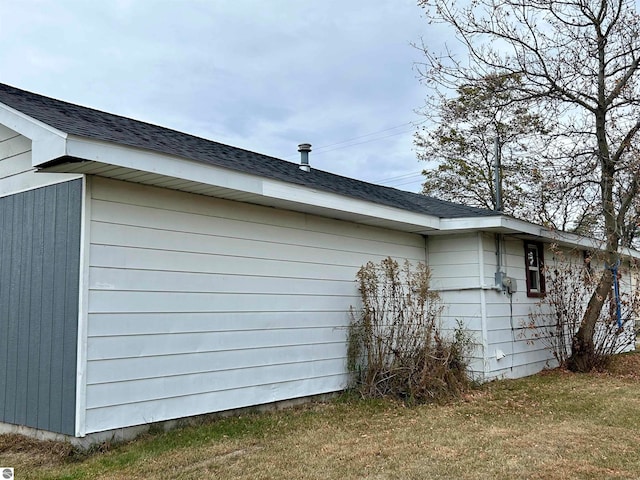 view of home's exterior featuring a lawn