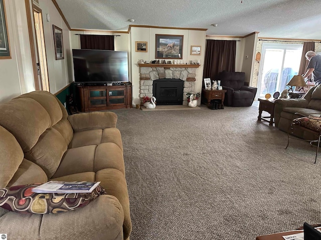 living room with a stone fireplace, crown molding, carpet, and a textured ceiling