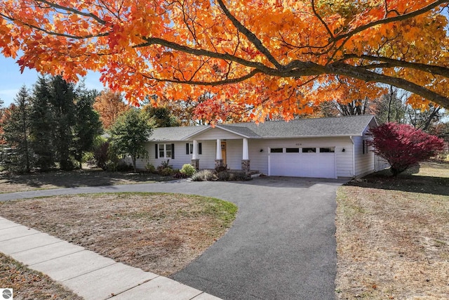 single story home with a garage